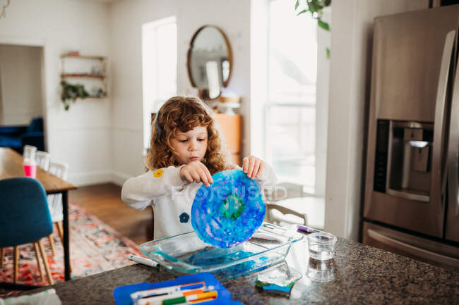 Cute little girl playing at home — Stock Photo
