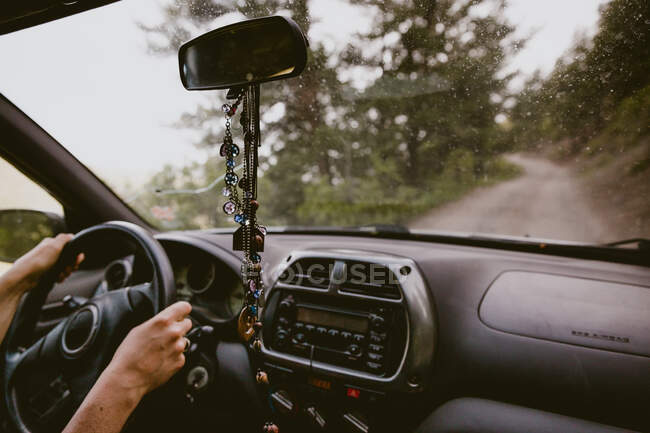 POV from passenger seat driving on a dirt road dirty windshield — Stock Photo