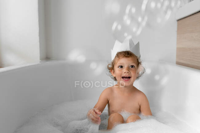 Cute little girl taking bath — Stock Photo