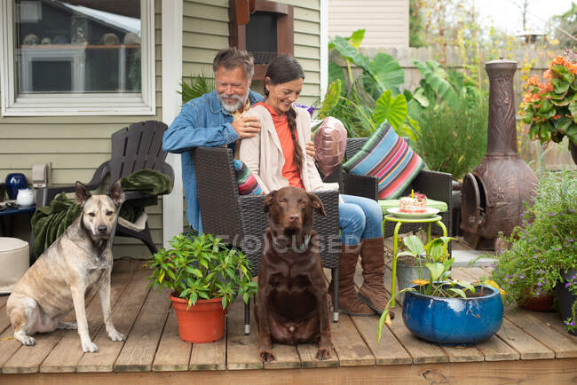 Couple hanging with thier pets — Stock Photo