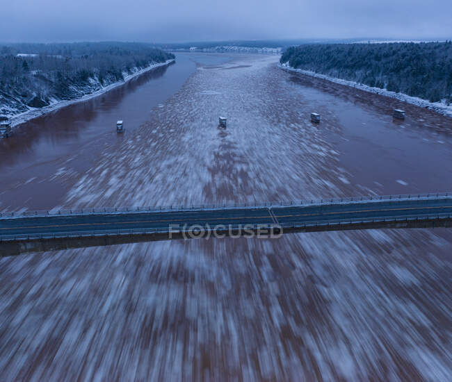 Ice Rushing By Bridges in Predawn Aerials — Stock Photo