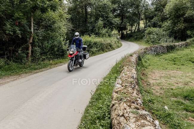 Man riding bike at the road — Stock Photo
