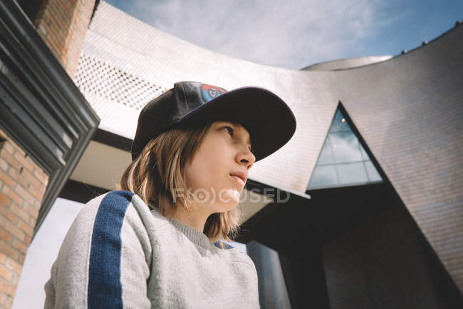 Young blonde woman with hat and white shirt — Stock Photo