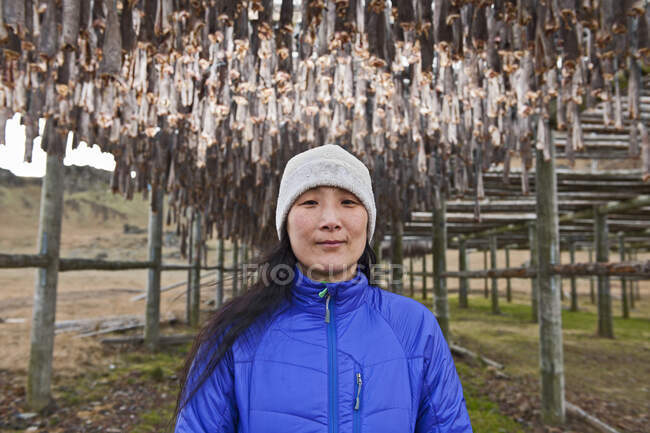 Cod fish hanging up for drying in the Eastern fjords of Iceland — Stock Photo