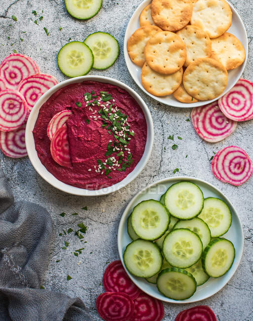 Beet soup with fresh vegetables and herbs, top view. — Stock Photo