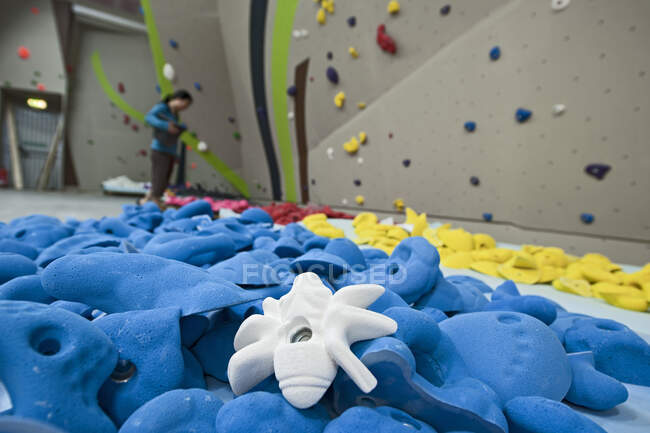 Close up of climbing holds at indoor climbing wall — Stock Photo