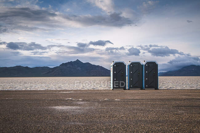 Beautiful landscape in the mountains and bio toilets — Stock Photo