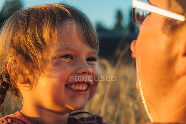 Father playing with his little daughter. Concept of friendly family. — Stock Photo
