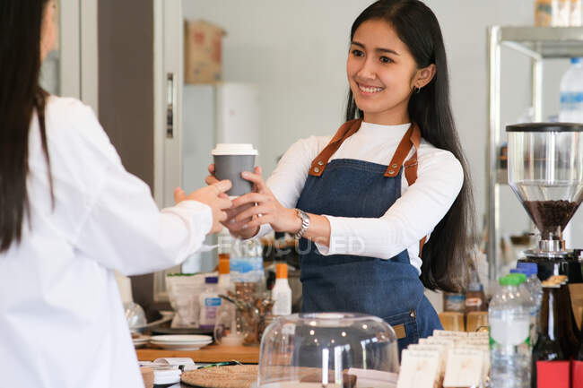Small Business and Owner Business Concept. Young owner of coffee cafe service customer — Stock Photo