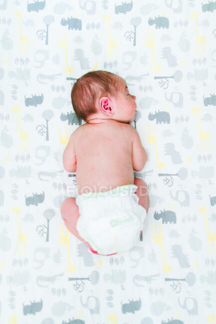 Baby boy with a pacifier — Stock Photo