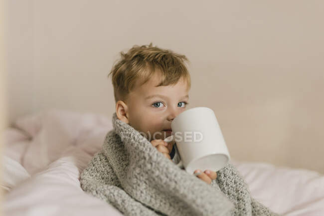 Young girl with fever on her head — Stock Photo