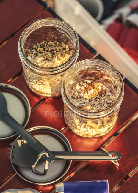 Close up of two glasses with granola — Stock Photo
