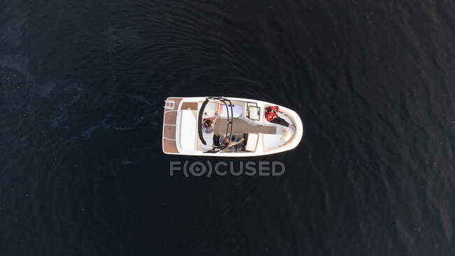 Aerial view of boat on dark water of lake in Ontario, Canada. — Stock Photo