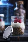 Sweet desserts in jars on table, close up — Stock Photo