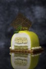 Meringue dessert with cream and yellow mirror glaze — Stock Photo
