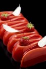 Close-up view of strawberry cakes with chocolate decorations — Stock Photo