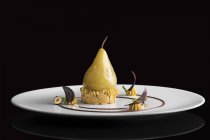 Baked pear dessert on plate — Stock Photo