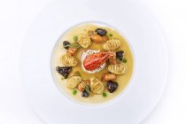Lobster dish with gnocchi and morels mushrooms — Stock Photo