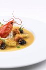 Lobster dish with gnocchi and morels mushrooms, close-up — Stock Photo