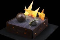 Chocolate cake with galaxy glaze and planets decorations — Stock Photo