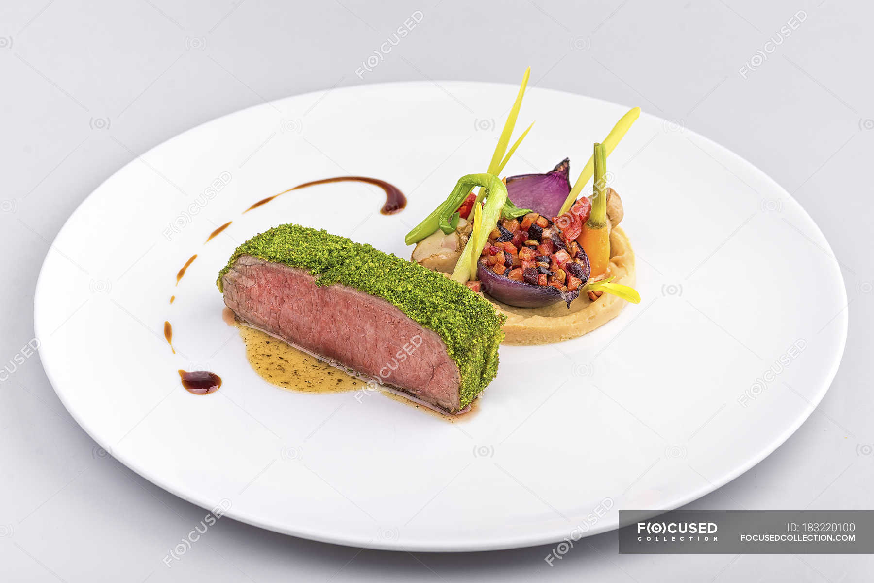 meat-steak-with-green-pesto-and-vegetable-garnish-dinner-creative