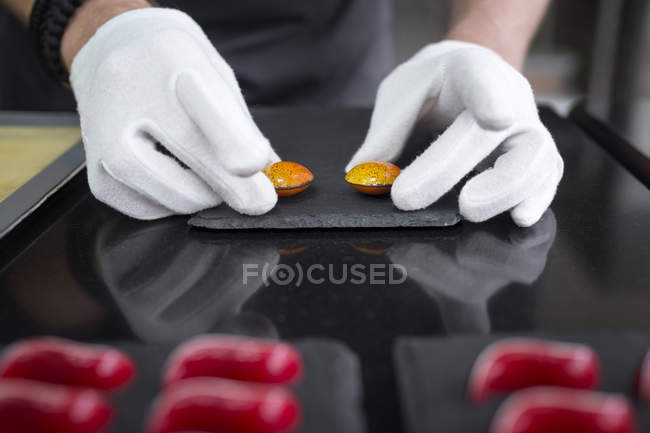 Close-up view of confectioner making chocolate candies — Stock Photo