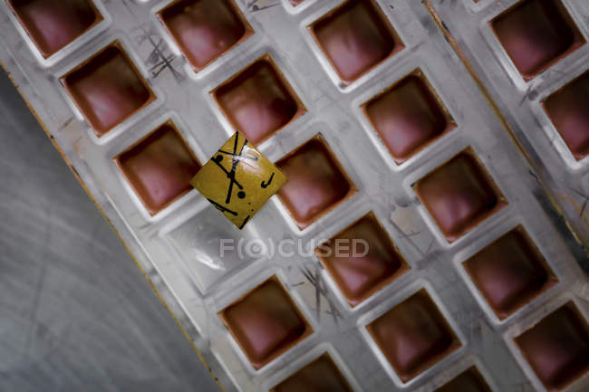 Doces com padrão abstrato no molde de doces — Fotografia de Stock