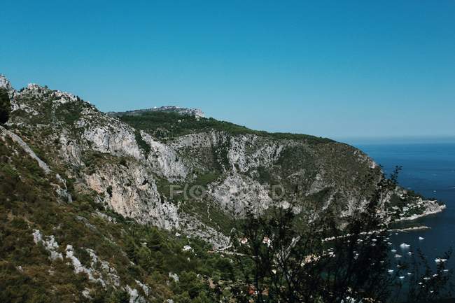 Scenic landscape of coastal mountains on sunny day — Stock Photo