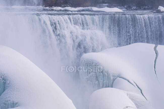 Steam over Niagara waterfall in winter time, Ontario, Canada — Stock Photo