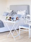White breakfast table and chair in bedroom — Stock Photo