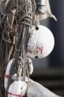 Front view of rope and buoys with defocussed background — Stock Photo