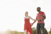 Low angle view of mid adult couple walking — Stock Photo
