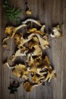 Top view of fresh chanterelles on wooden table — Stock Photo