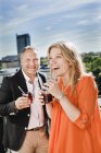 Portrait of couple drinking cocktails — Stock Photo