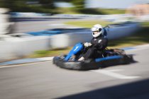 Man driving race car, blurred motion — Stock Photo