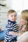 Portrait of boy with mother, selective focus — Stock Photo