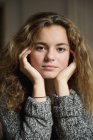 Portrait of teenage girl with curly hair — Stock Photo