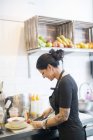 Portrait of woman working in cafe, selective focus — Stock Photo