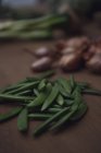 Nahaufnahme von grünen Bohnen Tisch — Stockfoto