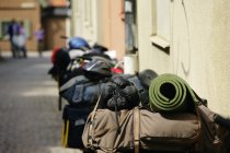 Front view of luggage in street with defocussed background — Stock Photo