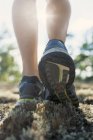 Close-up view of womans legs in running shoes — Stock Photo