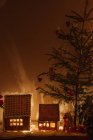 Illuminated gingerbread houses, christmas decorations — Stock Photo