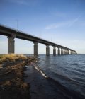 Low angle view of bridge in sunlight, Kapelludden, Sweden — Stock Photo