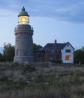 Перегляд Hammeren маяк висвітлюватися на вечір — стокове фото