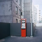 Red parking meter set on street — Stock Photo
