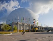 Globe Arena in Stockholm with man riding bicycle — Stock Photo