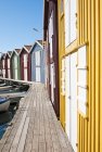 View of colorful fishing huts in bright sunlight — Stock Photo