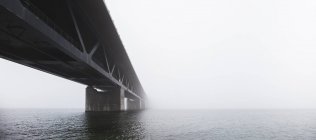 View of Oresund Bridge covered in fog — Stock Photo