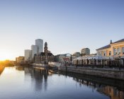 Waterfront cityscape at sunset, Malmo, Sweden — Stock Photo