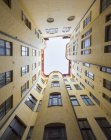 Bottom view of square courtyard and sky — Stock Photo
